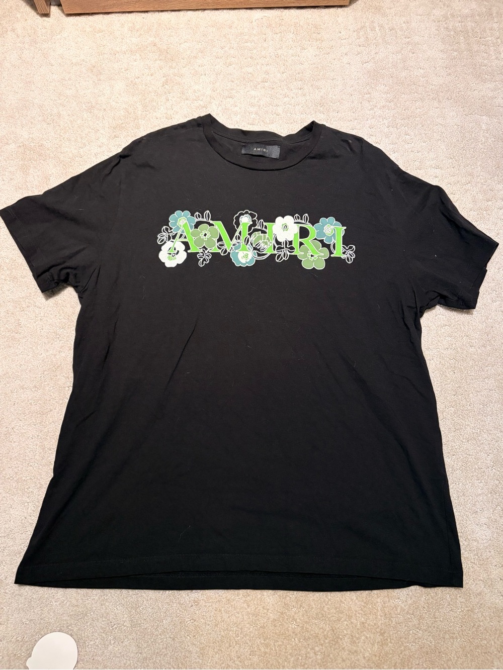 AMIRI Black Tee with Green Floral Logo